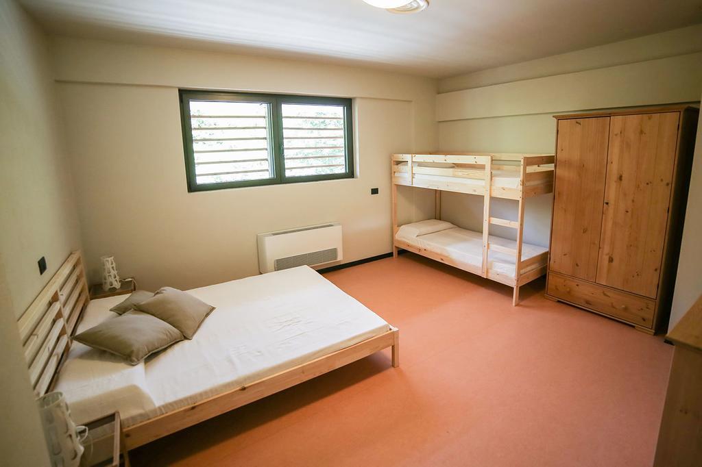 Oasi Hostel Merone Habitación foto