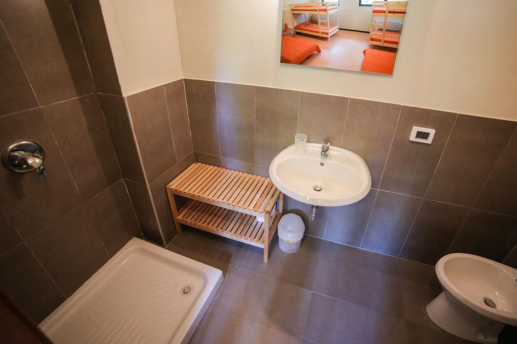 Oasi Hostel Merone Habitación foto