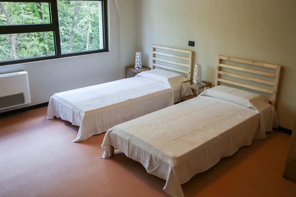 Oasi Hostel Merone Habitación foto
